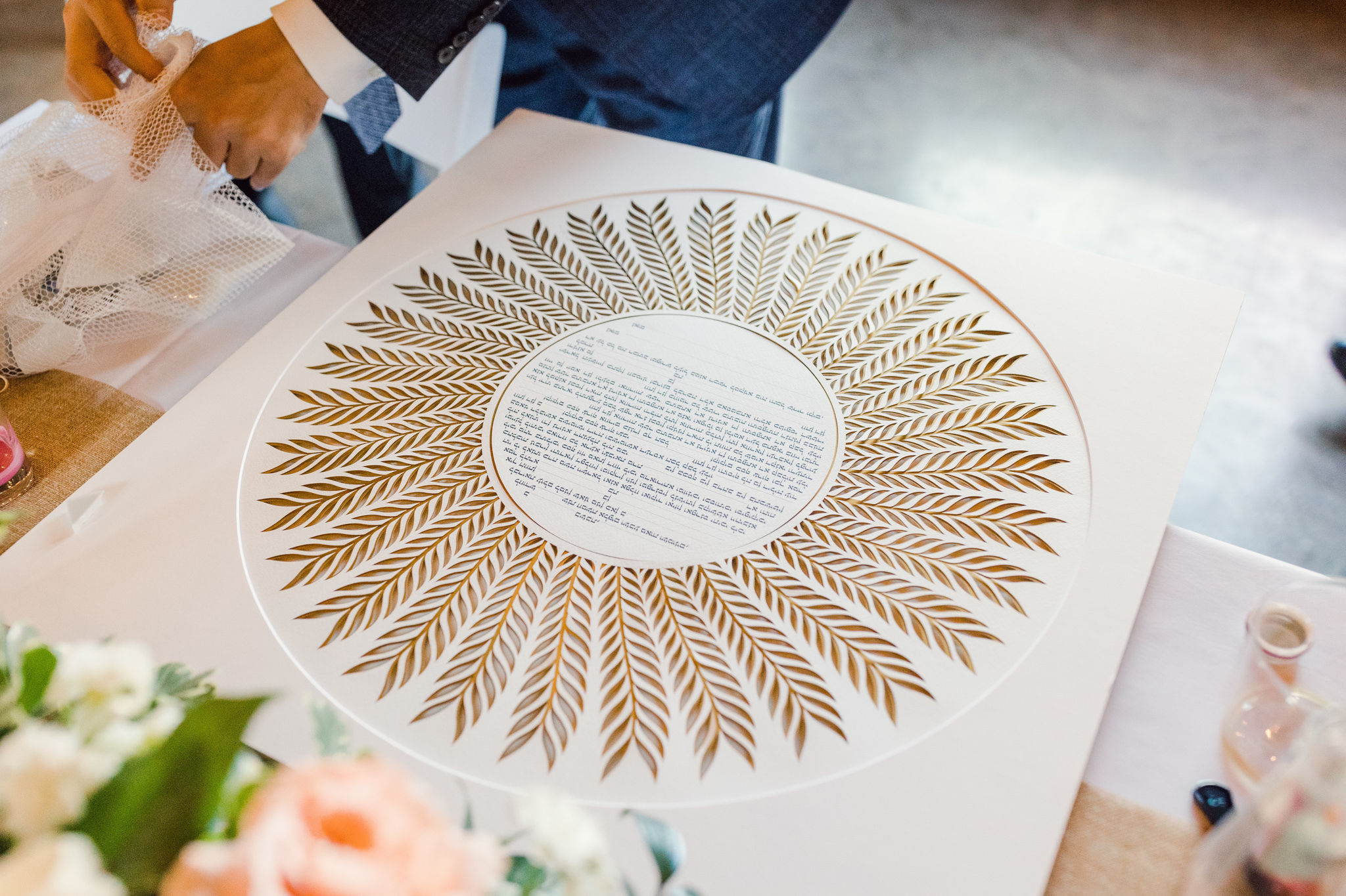 7. A photo of a well-preserved, treasured Ketubah displayed in a home